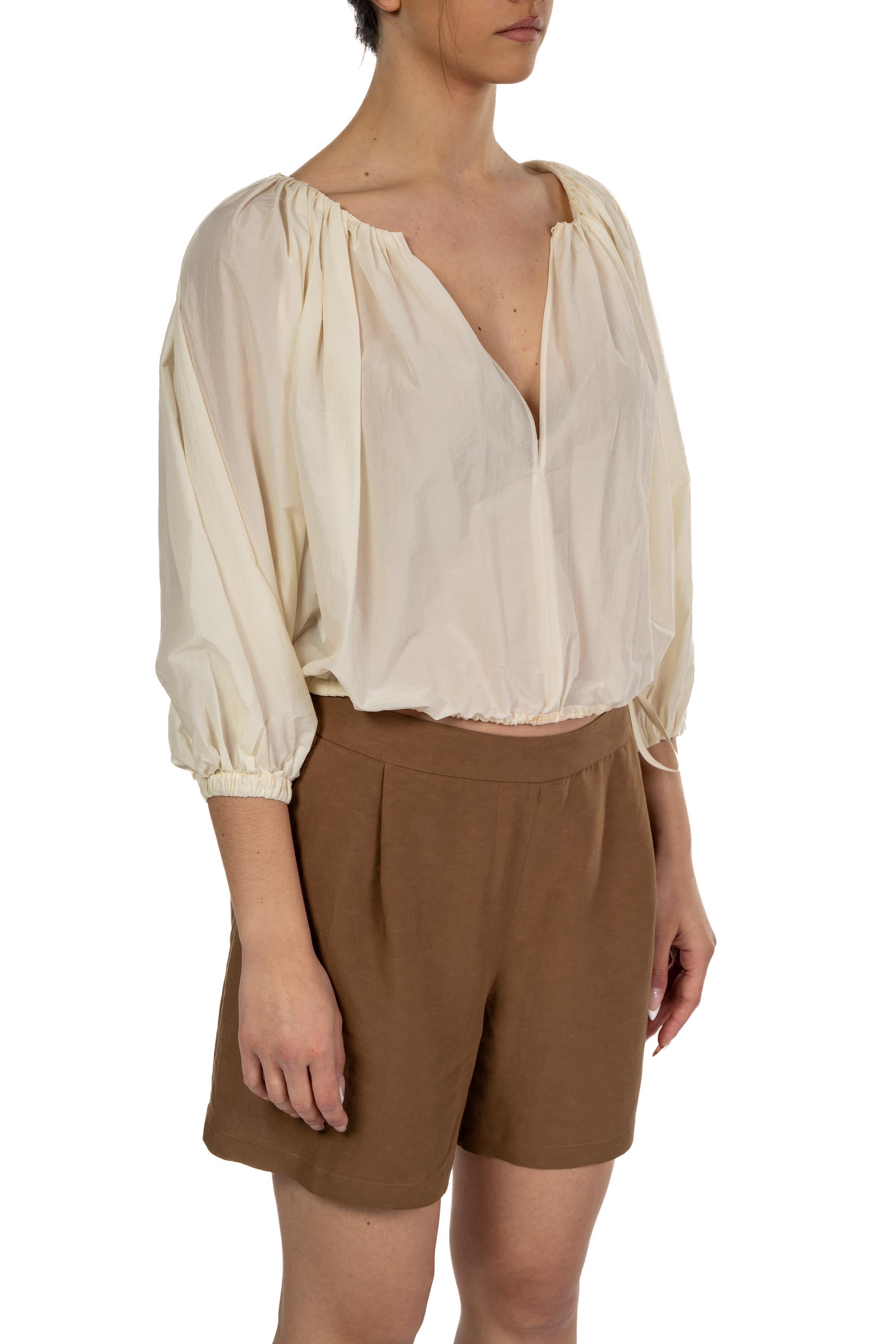 Blusa cropped in nylon A0213 2120 003 AVORIO PHILOSOPHY