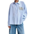 Camicia oversize a righe con decotazioni